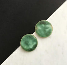 Load image into Gallery viewer, Large circle, ceramic stud earrings with green glaze.
