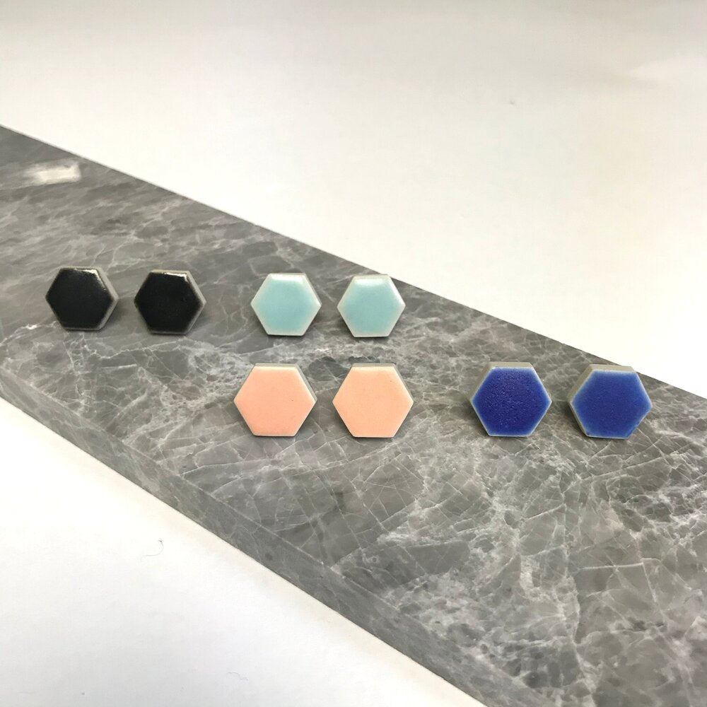 Hexgaon shaped ceramic stud earrings in a variety of colours