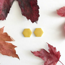 Load image into Gallery viewer, Hexgaon shaped ceramic stud earrings with yellow glaze

