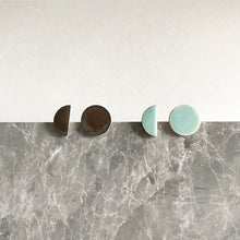 Load image into Gallery viewer, Semi circle shaped, ceramic stud earrings with seafoam or bronze glaze.
