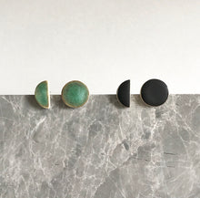 Load image into Gallery viewer, Semi circle shaped, ceramic stud earrings with black or green glaze.
